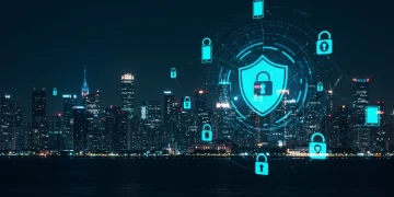 Futuristic cityscape with glowing IoT devices and a digital security shield, representing advanced IoT protection.