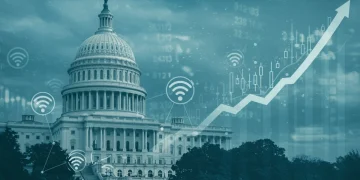 Futuristic wireless network with financial growth charts and US Capitol in background, symbolizing FCC spectrum policy impact.